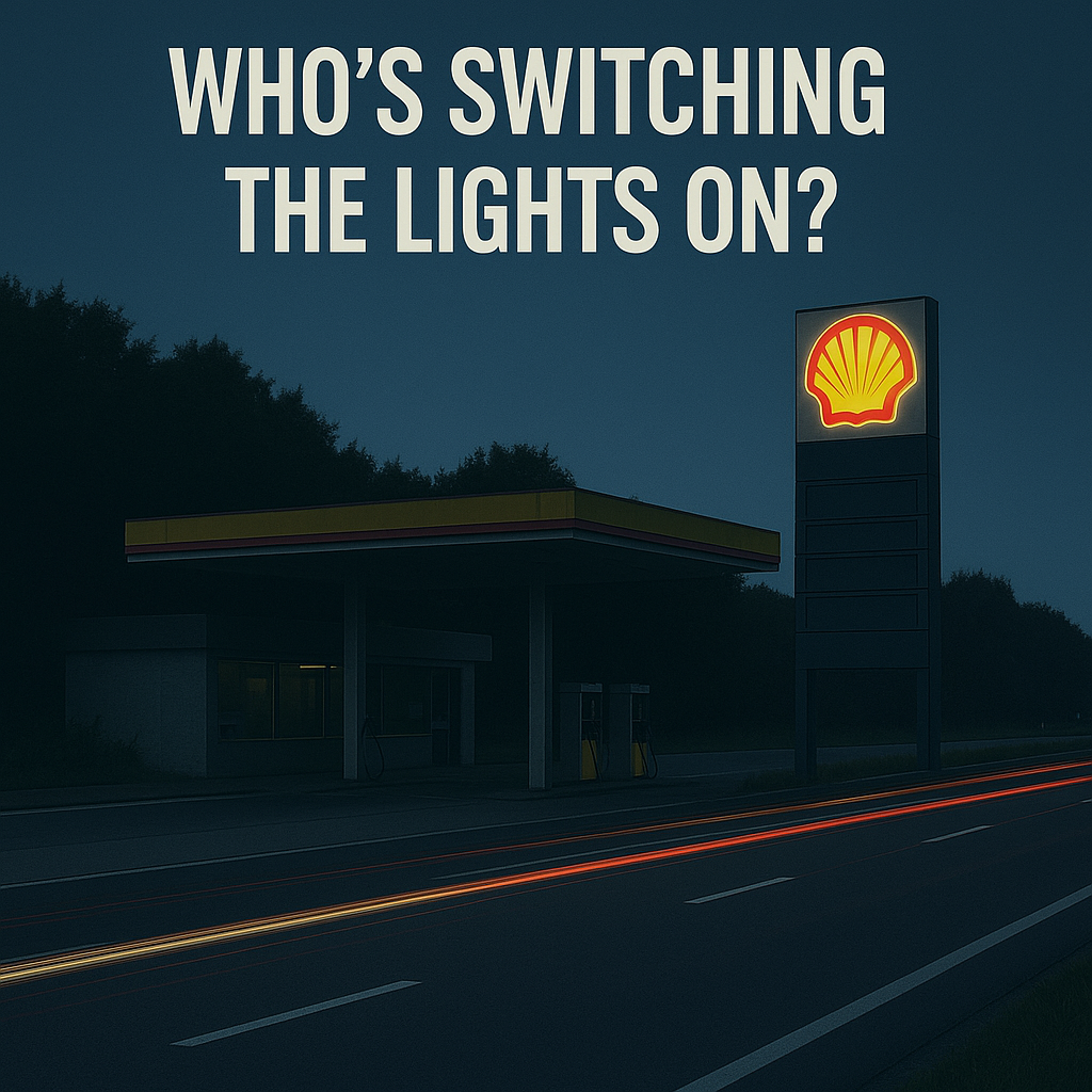 A service station on the side of the road with the lights out.